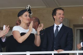 Actress Kate Winslet and husband Ned Rocknroll attend the 'Prix de Diane Longines 2014' at Hippodrome de Chantilly on June 15, 2014 in Chantilly, France