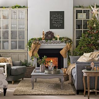 Living room with fireplace and Christmas decorations