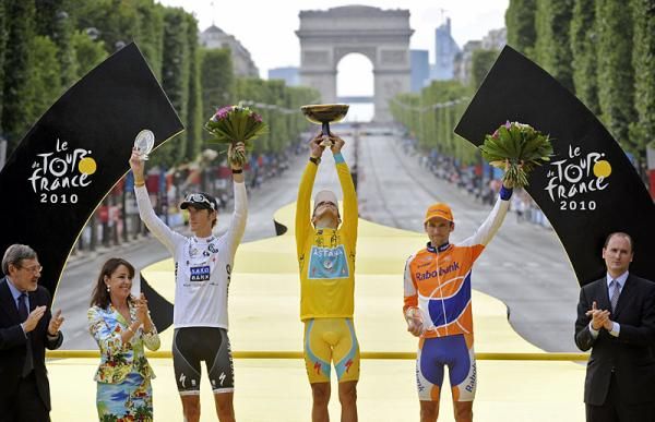 The Tour's final podium in Paris: (l-r): Andy Schleck (Saxo Bank), Alberto Contador (Astana) and Denis Menchov (Rabobank).