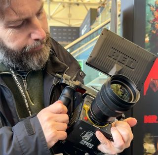 Adam Juniper holding Red Komodo X camera