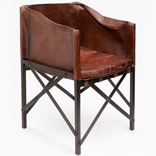 leather brown chair with black legs