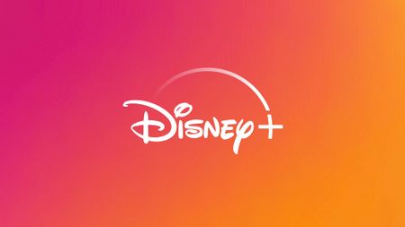 Disney Plus logo on orange pink background