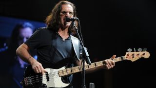 Geddy Lee performing onstage with Rush in 2008
