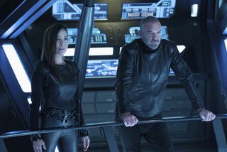 Phillipa Georgiou (Michelle Yeoh) confers with Leland (Alan Van Sprang) about a new recruit to the clandestine Section 31 in the "Star Trek: Discovery" episode "Point of Light."