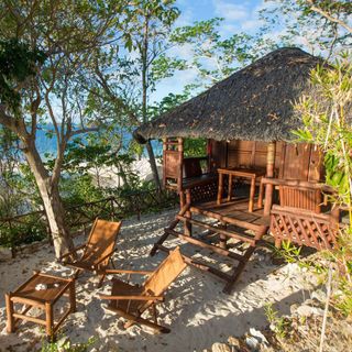 island hut with bamboo cottage and outdoor terrace