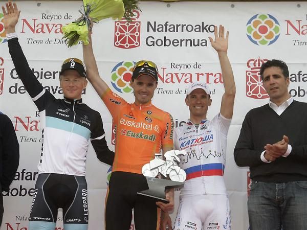 The podium at the 2011 GP Miguel Indurain (L-R): Fabian Wegmann (Leopard Trek), Samuel Sanchez (Euskaltel-Euskadi) and Alexandr Kolobnev (Katusha) are joined on stage by Miguel Indurain himself