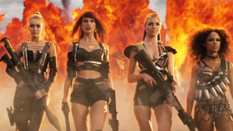 Taylor Swift and 3 other women in extreme military outfits.