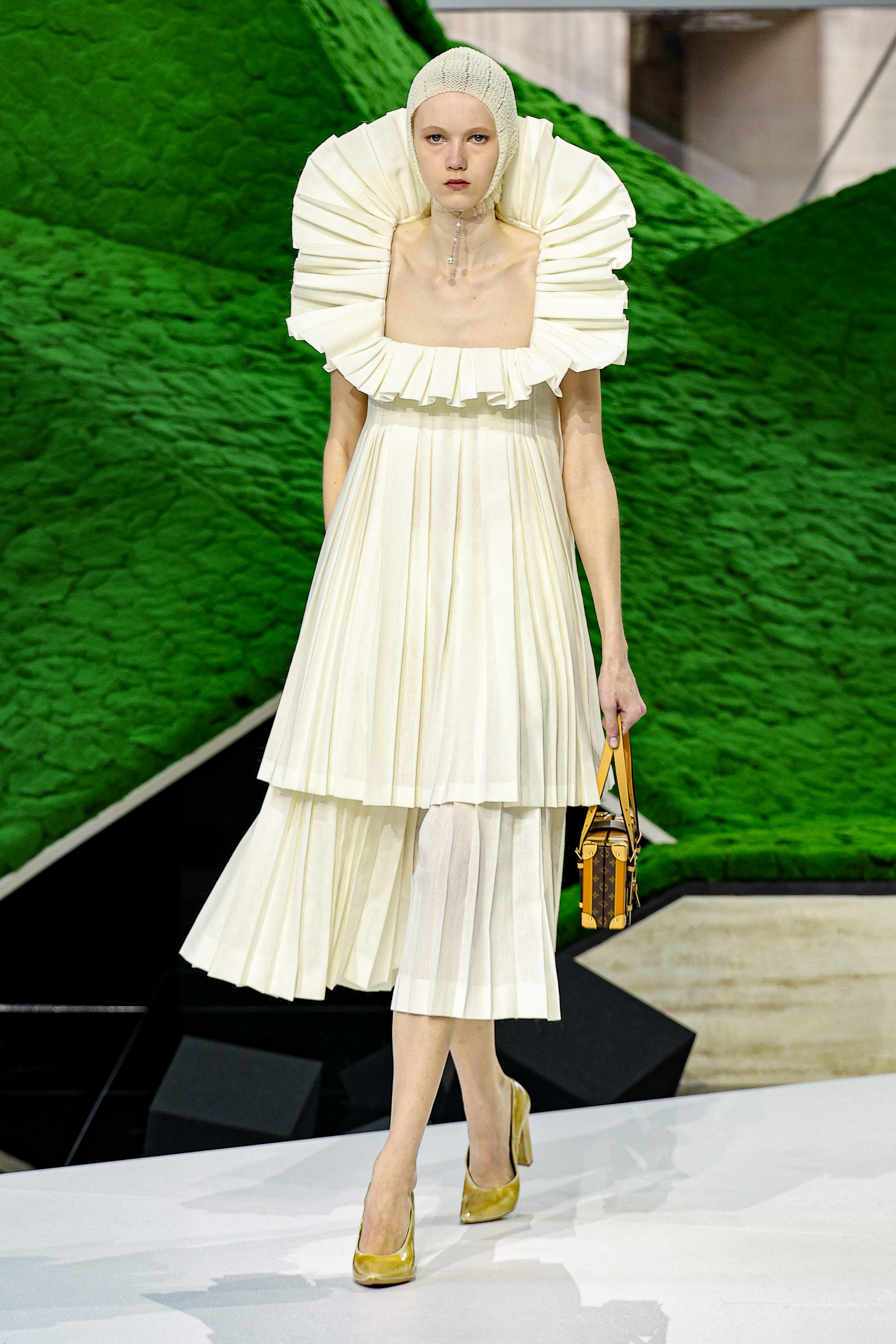 A mode walks the runway during the Louis Vuitton Womenswear Fall/Winter 2026-2027 show as part of Paris Fashion Week on March 10, 2026 in Paris, France