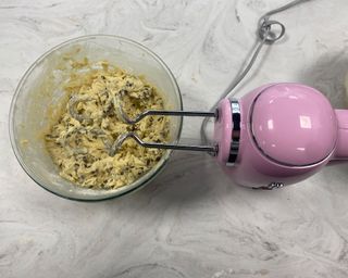 Image of Smeg retro hand mixer during cookie dough test