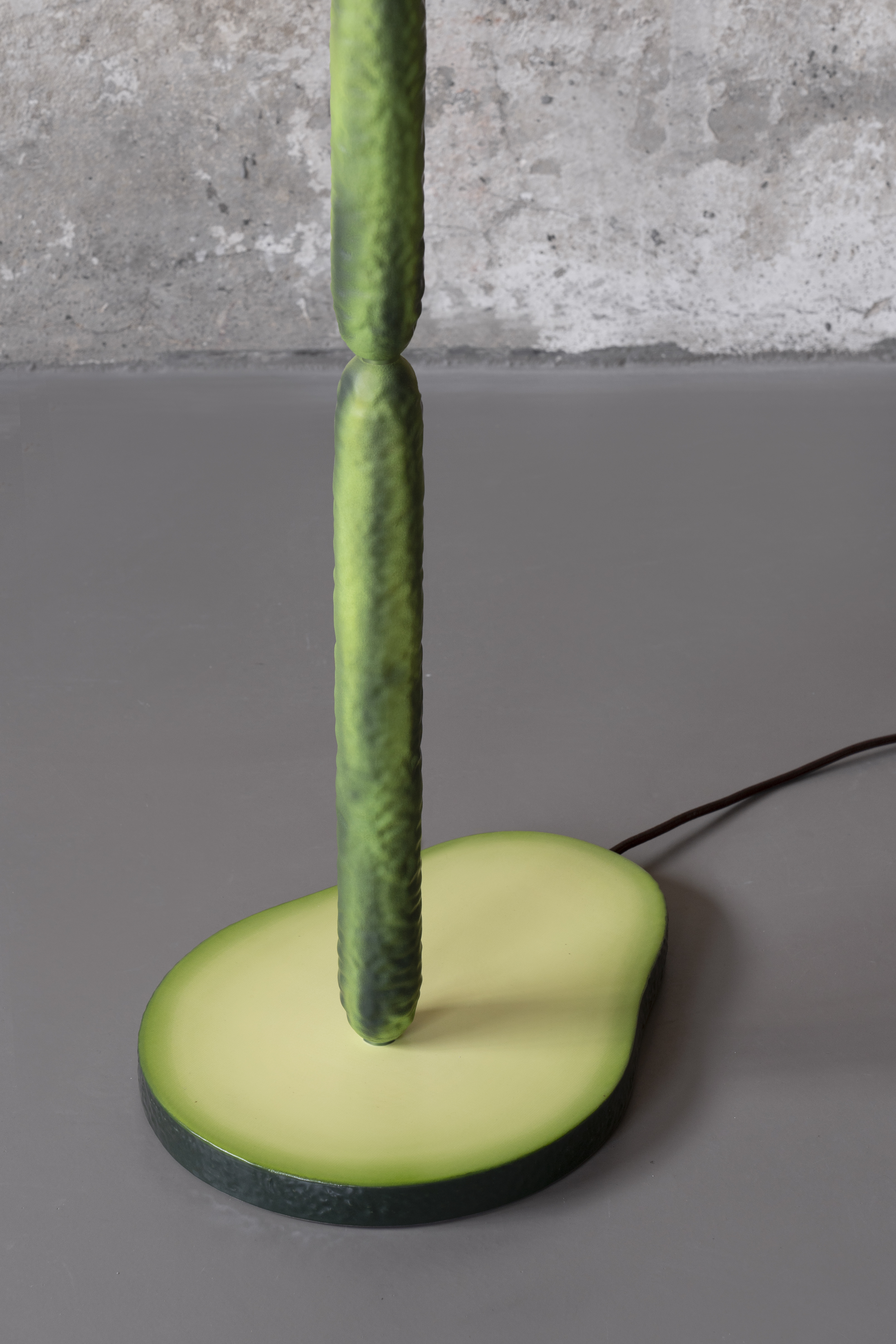 Avocado-like base of cucumber-shaped lamp, part of Bitossi OMG GMO fruit furniture by Robert Stadler