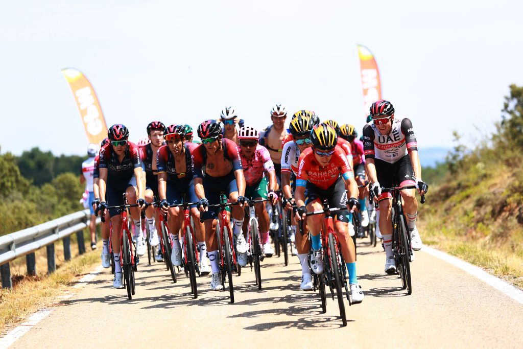 VILLADIEGO SPAIN AUGUST 03 LR Laurens De Plus of Belgium Omar Fraile Matarranz of Spain Andrey Amador Bikkazakova of Costa Rica and Team INEOS Grenadiers Jonathan Klever Caicedo Cepeda of Ecuador and Team EF Education Easypost Hermann Pernsteiner of Austria and Team Bahrain Victorious and the peloton compete during the 44th Vuelta a Burgos 2022a Stage 2 a 158km stage from Vivar del Cid to Villadiego on August 03 2022 in Villadiego Spain Photo by Gonzalo Arroyo MorenoGetty Images