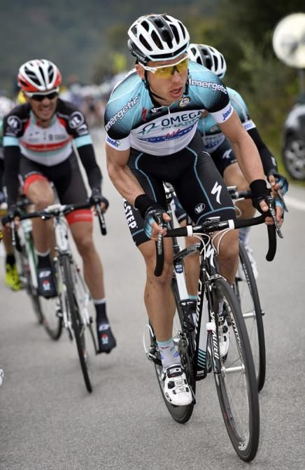 Tony Martin (Omega Pharma-Quick Step) limits his losses on the mountain finish and is a contender for overall victory with a final time trial on Sunday.