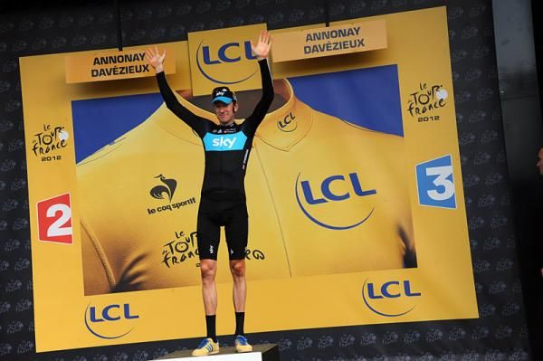 Bradley Wiggins (Sky) on the podium to receive another yellow jersey.