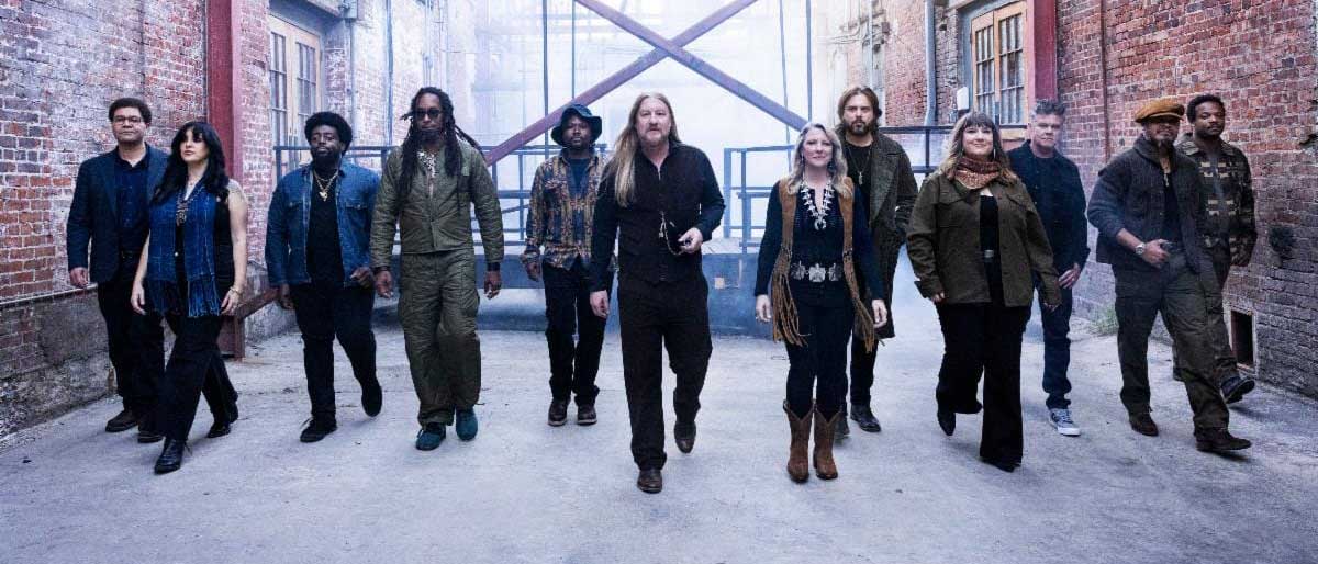 Tedeschi Trucks Band walking down an alley