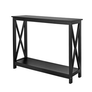 A black console table with criss-cross sides
