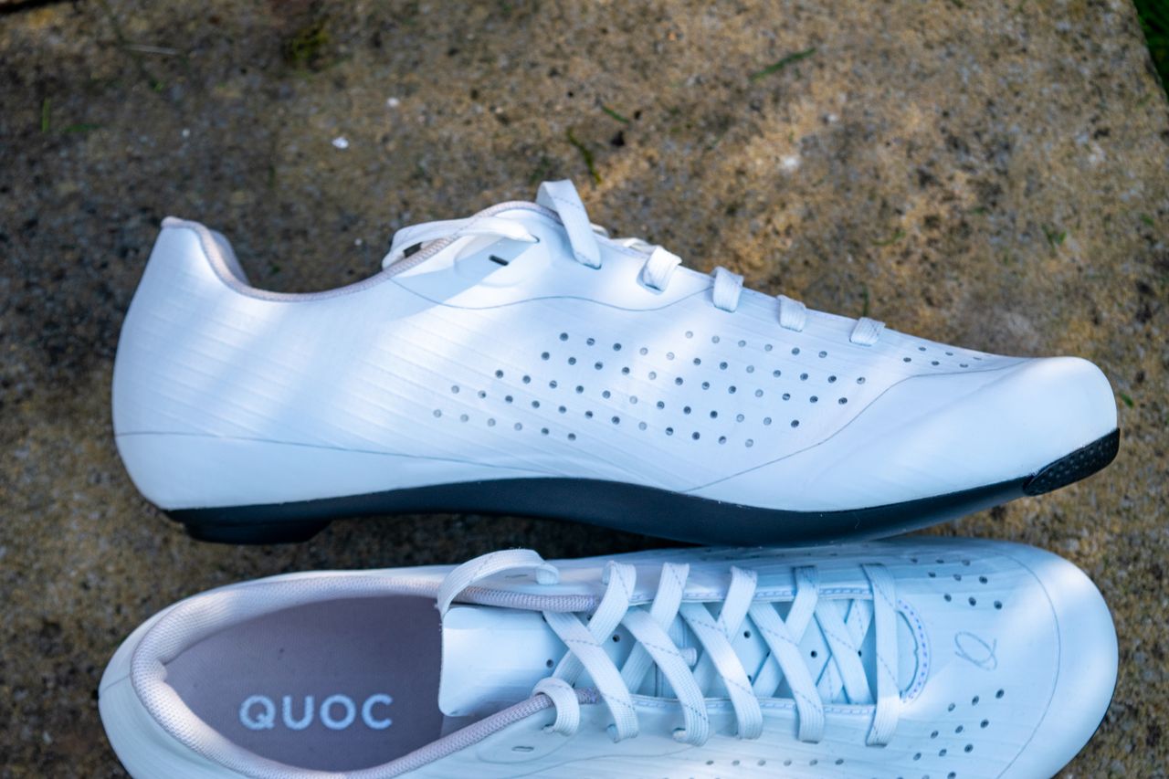 A pair of white Quoc M Pro Lace shoes