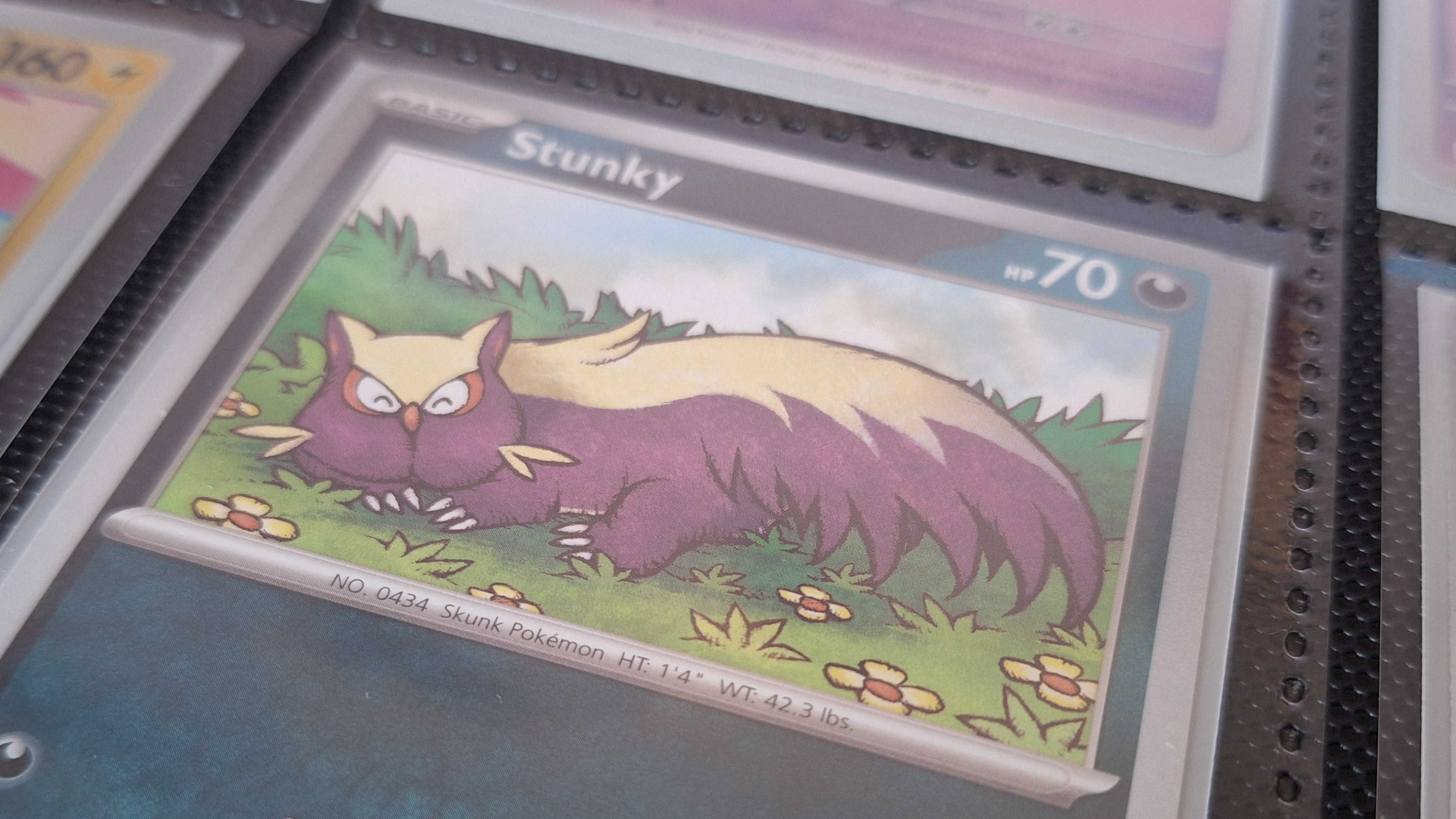 A Stunky card in a binder