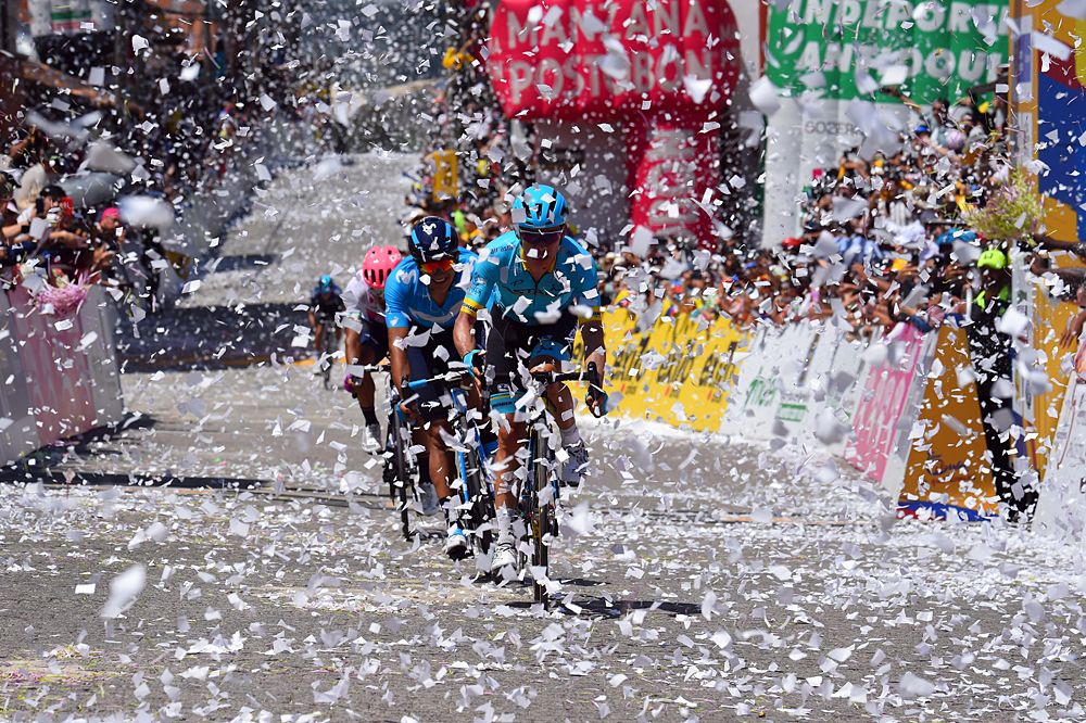 Miguel Angel Lopez (Astana Pro Team) and Richard Carapaz (Movistar Team) sprint in for second and third behind stage winner Julian Alaphilippe
