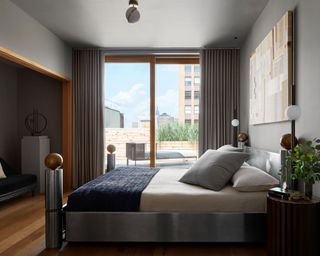 Modern bedroom with dark gray color scheme