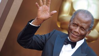 Actor Sidney Poitier arrives at the 86th Annual Academy Awards at Hollywood & Highland Center on March 2, 2014 in Hollywood, California.