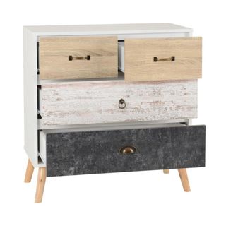 A distressed chest of drawers
