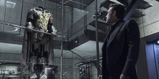 Ben Affleck looking at Robin suit in Batman v Superman: Dawn of Justice