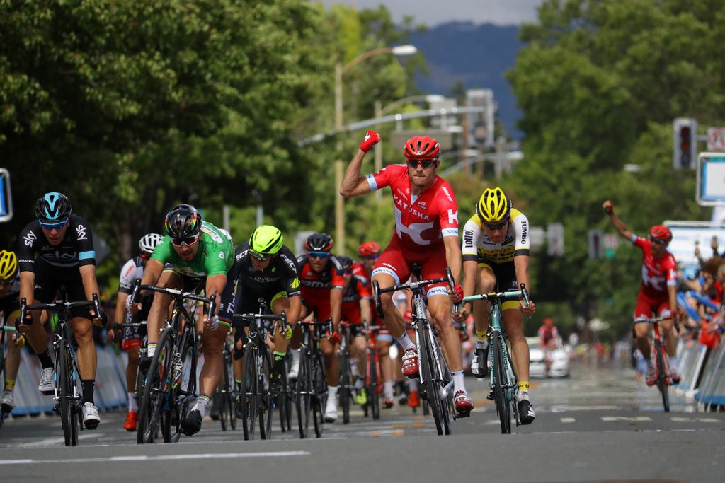 Peter Sagan throws his bike as Alexander Kristoff (Katusha) celebrates victory