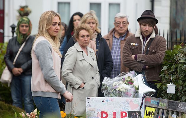 The residents gather in the Square to say their goodbyes to Shakil