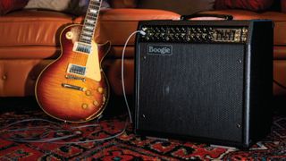 A Mesa/Boogie Mark VII amplifier sits to the right of a Gibson Les Paul