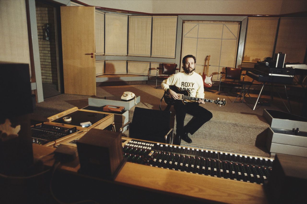 Phil Manzanera Of Roxy Music recording in a studio