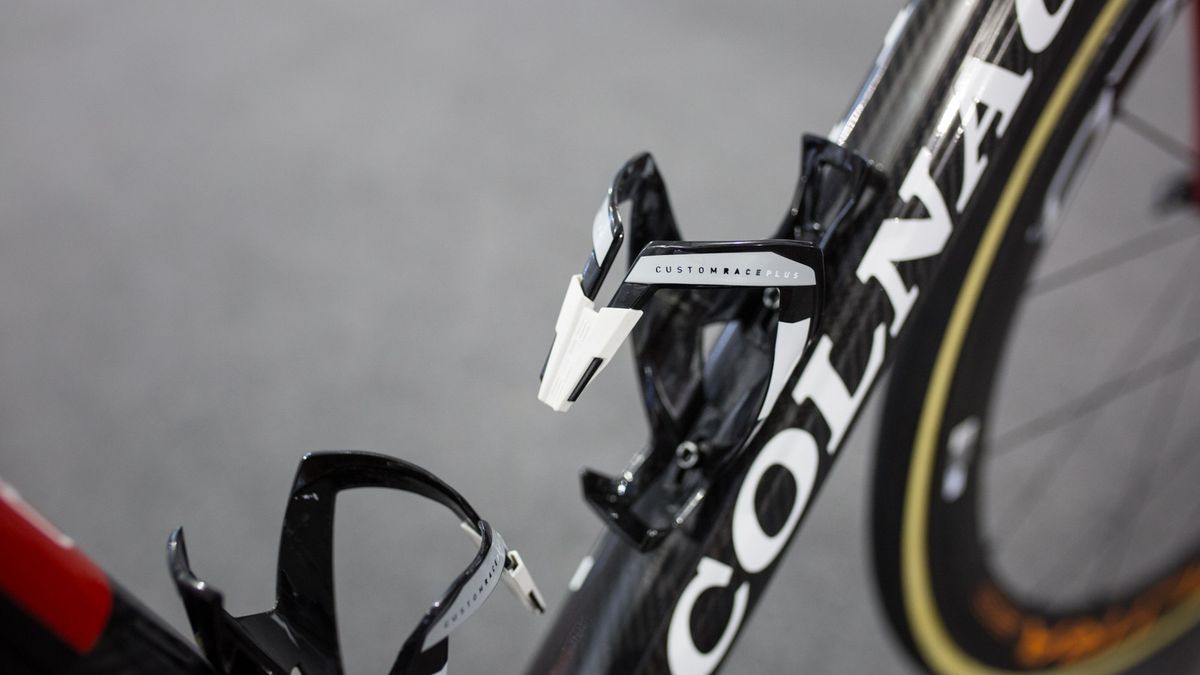 Quite a few riders are running the Elite Custom Race Plus cages. They are made from 'fibre reniforced material', not carbon