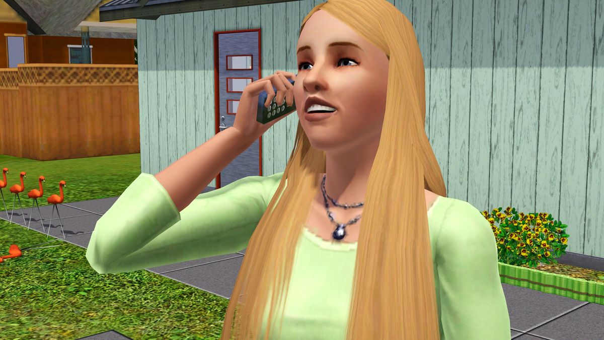 The Sims 3 - a sim with long hair and a green shirt smiles while talking on the phone