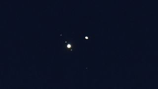 A telescopic view of the "great conjunction" of Jupiter and Saturn, on Dec. 21, 2020, as seen from Burnsville, North Carolina.