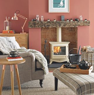Red living room with log burner