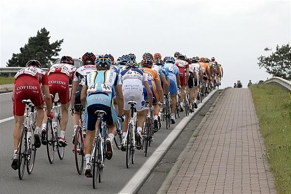 The peloton heads up one of the many small hills.