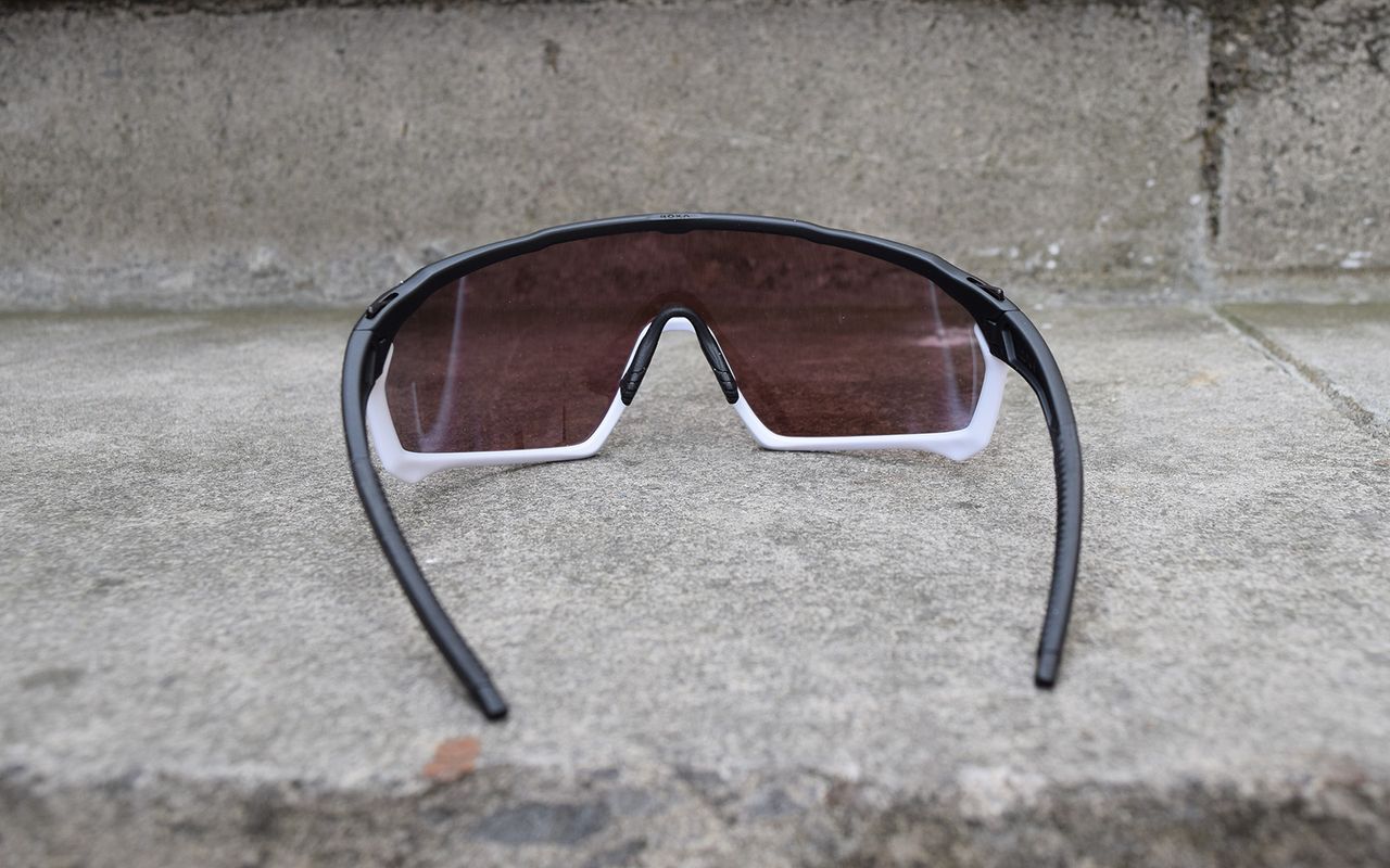 The frame has a two-tone white and black finish