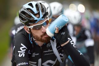 Great Britain's Bradley Wiggins drinks as he rides in the pack.