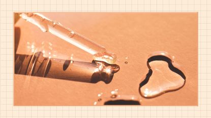Close-up of glass pipette with air bubbles spilling drops of transparent moisturizing lotion on beige background