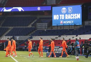 Basaksehir players arrive on the pitch before the start of the match at the Parc des Princes