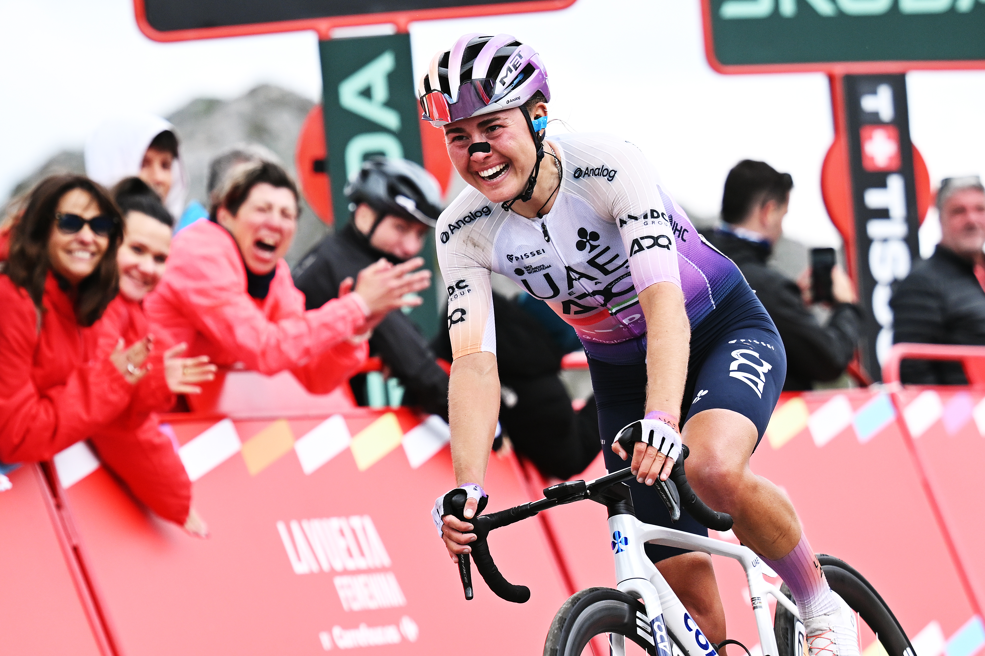 L'ANGLIRU, SPAIN - MAY 09: Overall race winner Paula Blasi of Spain and UAE Team ADQ celebrates at finish line during the 12th La Vuelta Femenina 2026, Stage 7 a 132.9km stage from Pola de Laviana to L'Angliru 1555m / #UCIWWT / on May 09, 2026 in Pola de Laviana, Spain. (Photo by Szymon Gruchalski/Getty Images)