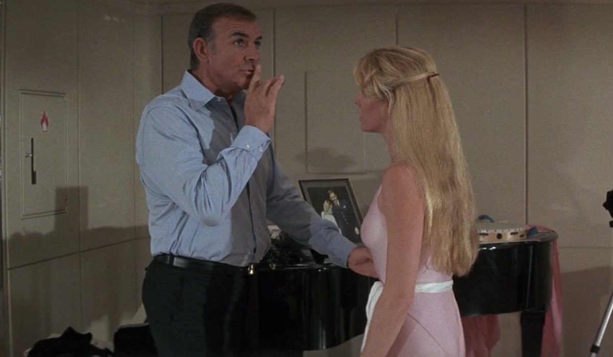 Sean Connery hushes Kim Basinger in the dance studio in Never Say Never Again.