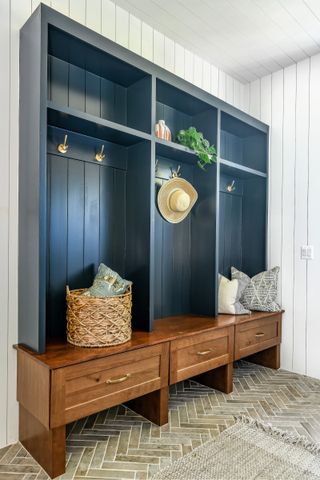 mudroom cabinet with mix of varnished and painted wood