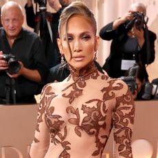 Jennifer Lopez at the 2026 Golden Globes in a vintage naked dress