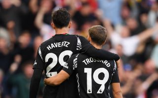 Arsenal duo Leandro Trossard and Kai Havertz embrace after their victory at Villa Park in August