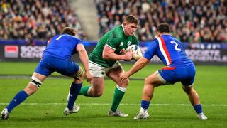 Tadhg Furlong of Ireland in action against Cyril Baille, left, and Julien Marchand of France during the Guinness Six Nations Rugby Championship