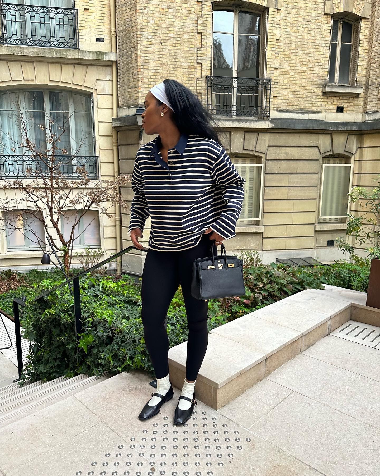 A woman wearing leggings.