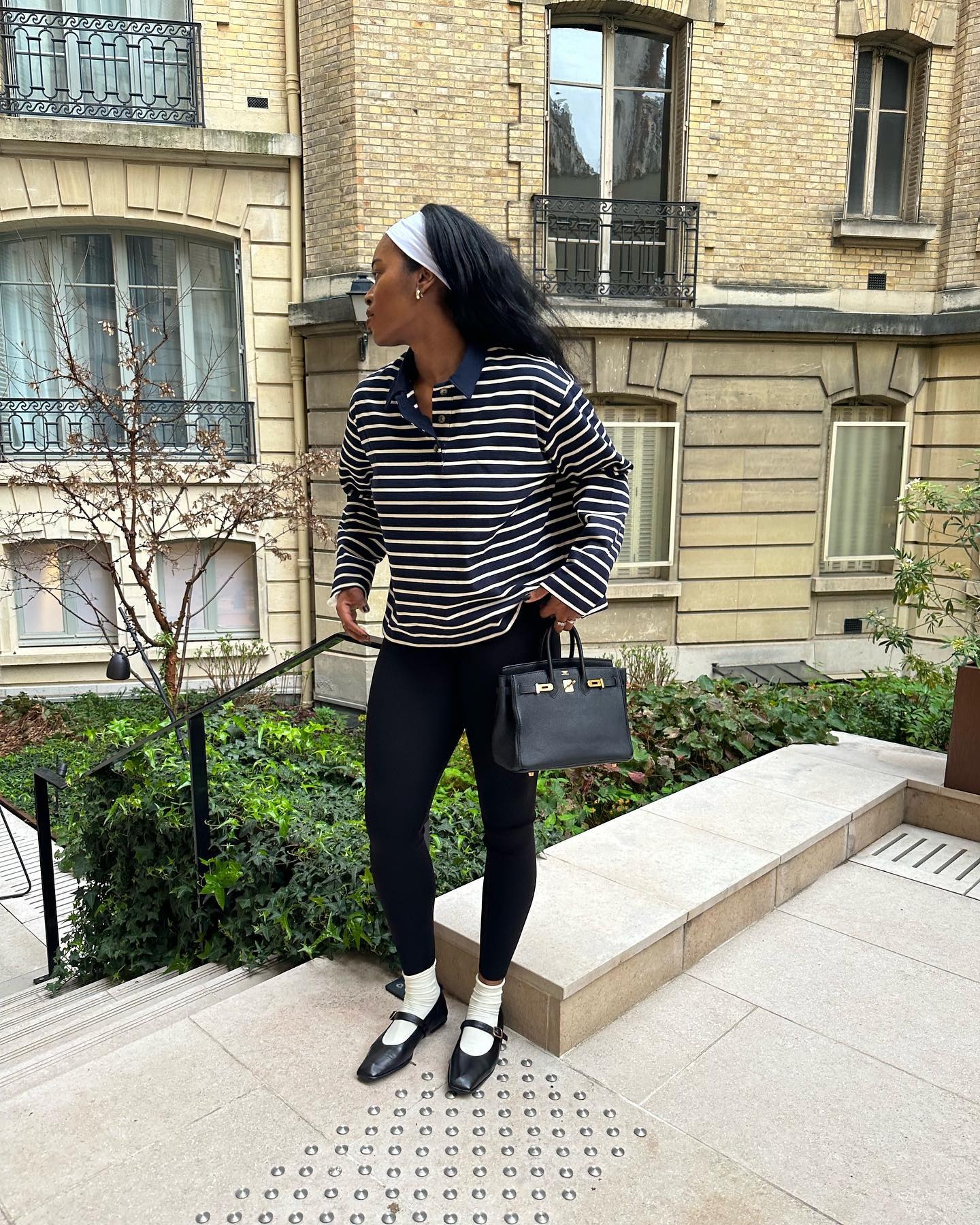 A woman wearing leggings.