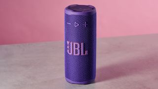 JBL Grip against pink background