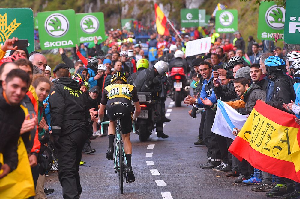Steven Kruijswijk climbs through the crowds on the Angliru