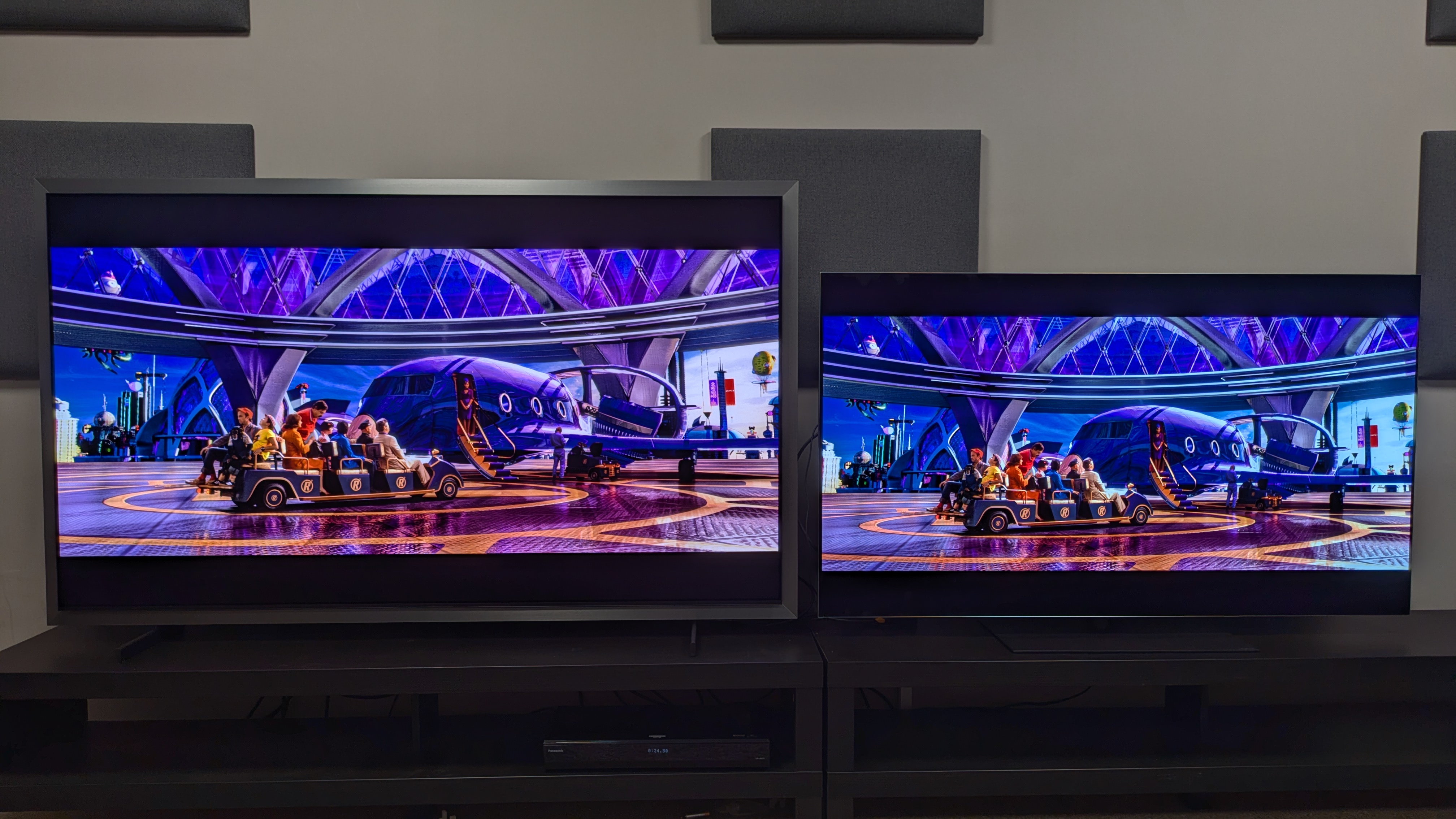 Samsung S99H (left) vs LG G6 (right) showing Royalton Industries from Speed Racer. Both TVs deliver the bold purples well, but the G6 has a little more depth, while the S99H is brighter.